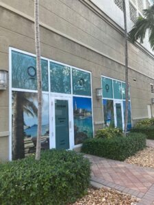Exterior of a Fort Lauderdale business adorned with impeccable commercial painting, exuding professionalism and curb appeal